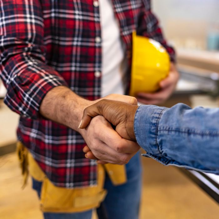 shaking contractor hand