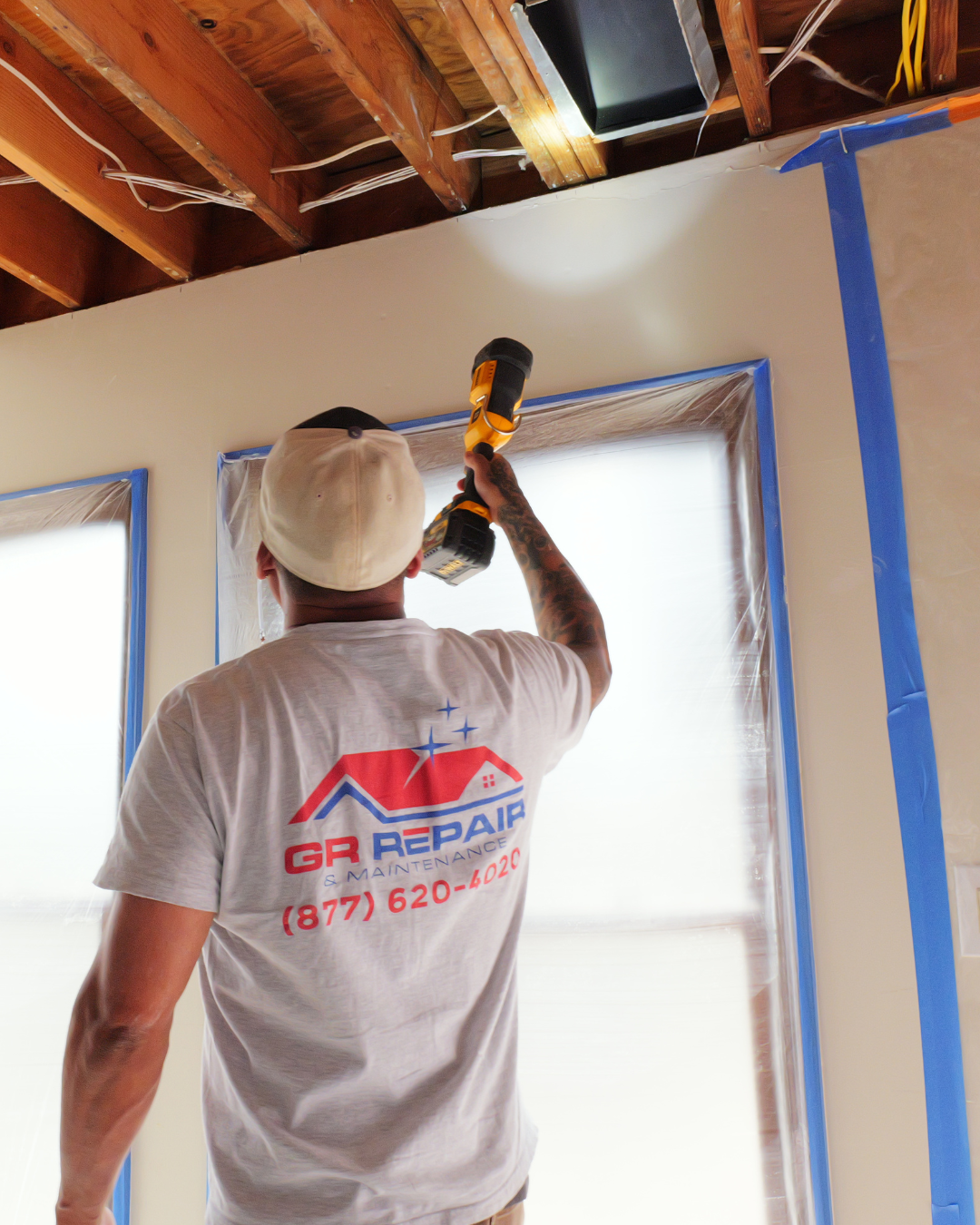 Drywall Repair by GR Repair & Maintenance Handyman from GR Repair & Maintenance working on drywall installation in a clean, prepared home interior