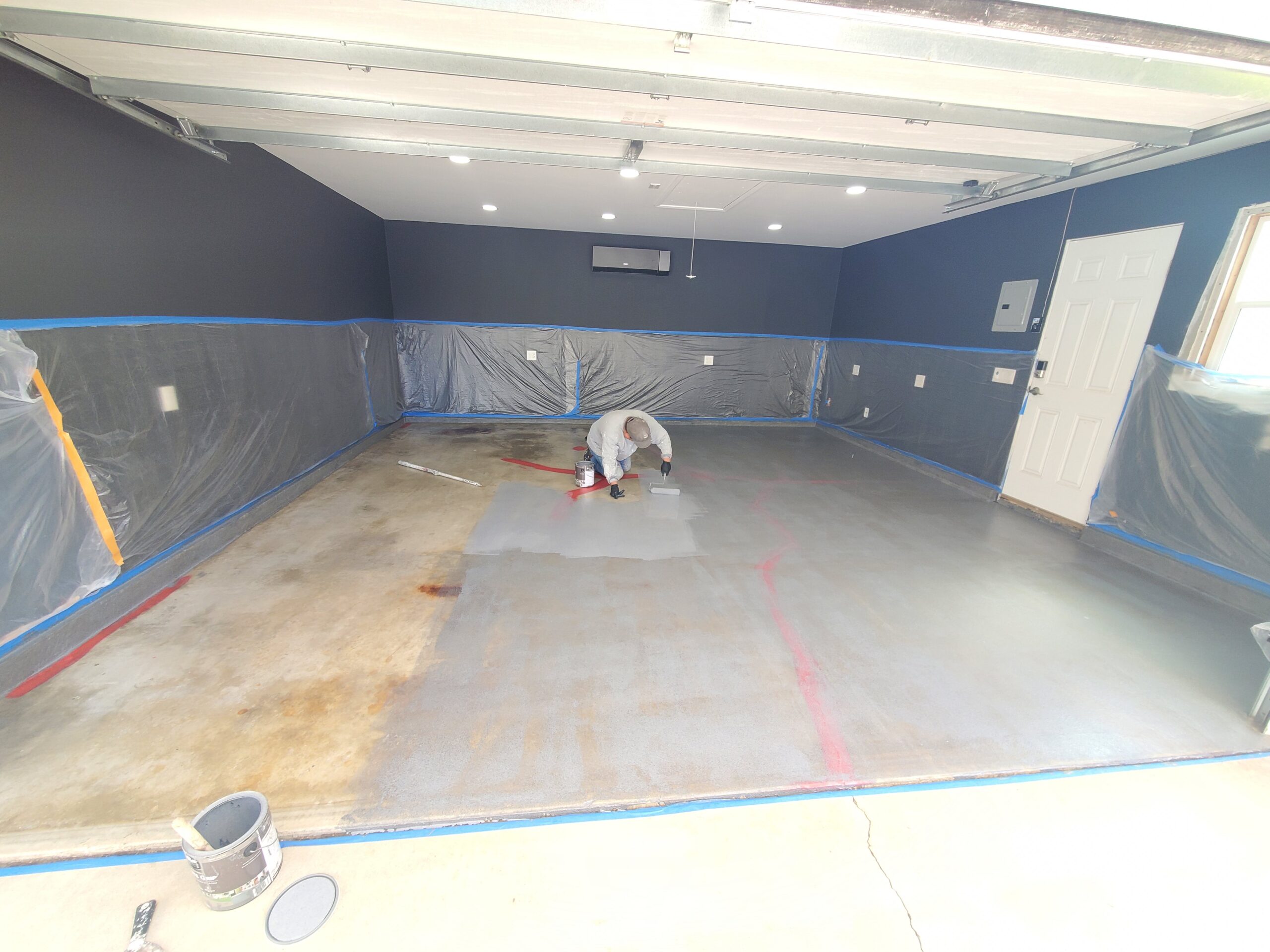 Garage floor painting during a remodel project in Long Beach