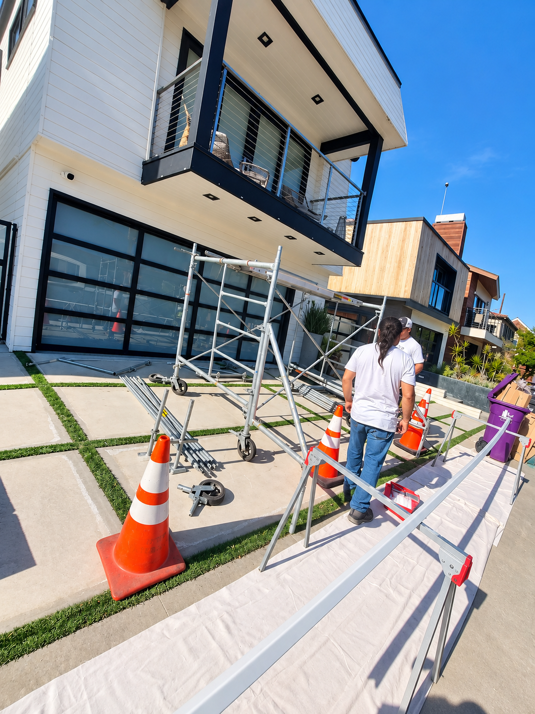 GR Repair & Maintenance team preparing scaffolding for a residential home improvement project